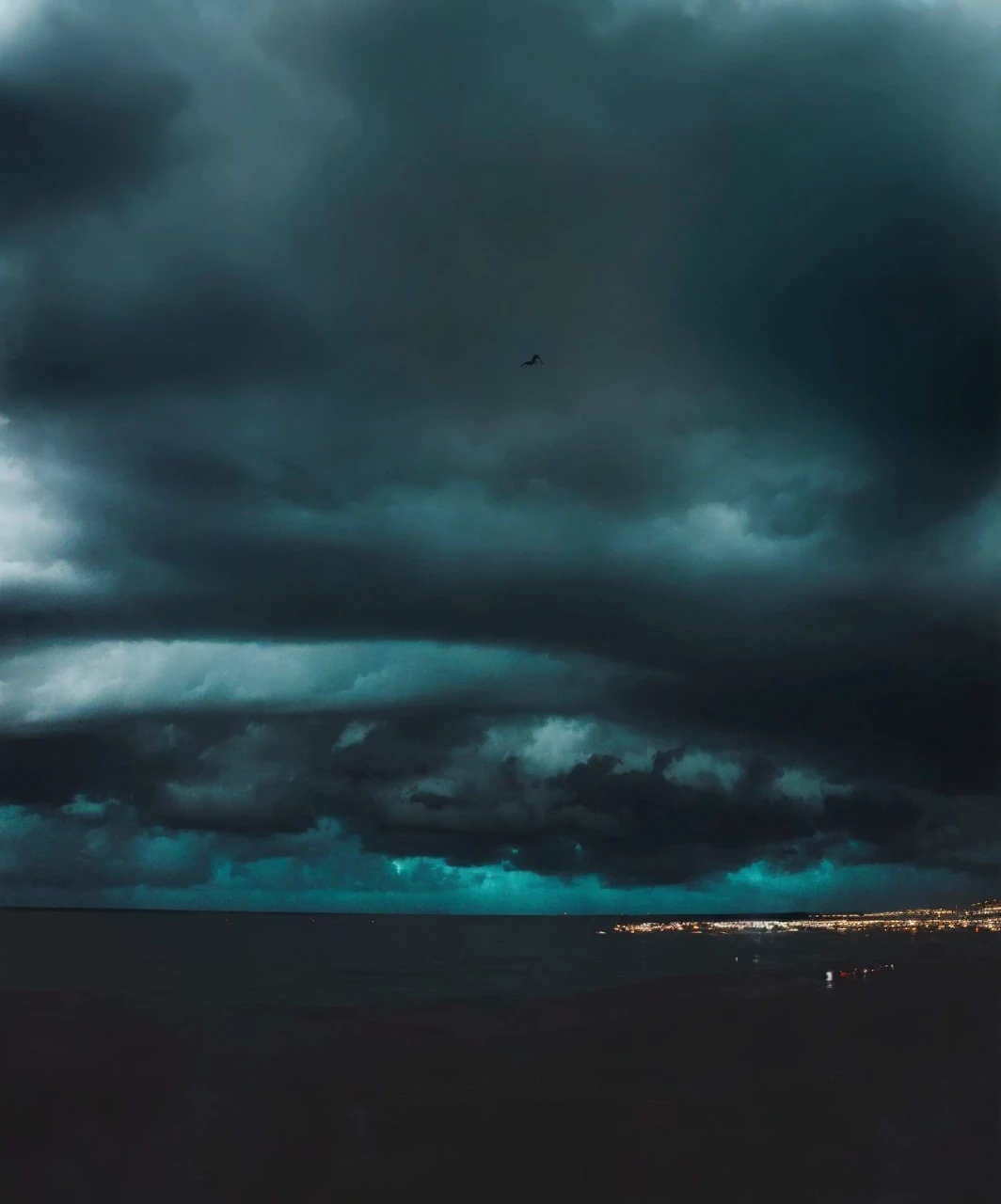 Monster over the sea made of stormy clouds. Darkness.