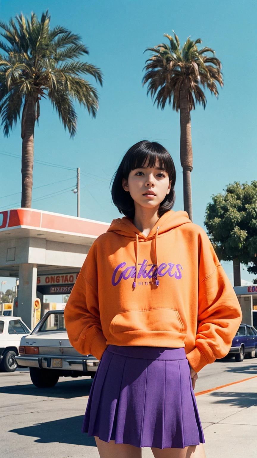 photo cinematic photograph long shot portraits by Wes Anderson, cute 23 yo girl ,fokus, bokeh ,wear ((orange color oversized_hoodie)), wear ((purple tennis skirt)),looking front,Best Quality,Masterpiece,Ultra High Resolution,(Realisticity:1.4),Original Photo, 1Girl, light leak,ultra high resolution,UHD,beautiful, (black bob hair), almond eye, no makeup, in front of ((80's los angles gas station)), (realistic:1.2), (surreal:1.3), (very detailed:1.1), ((masterpiece)),summer, blue sky, palm trees,sunny, los angles vibes,film camera, 800mm lens,style of Philip Lorca diCorcia