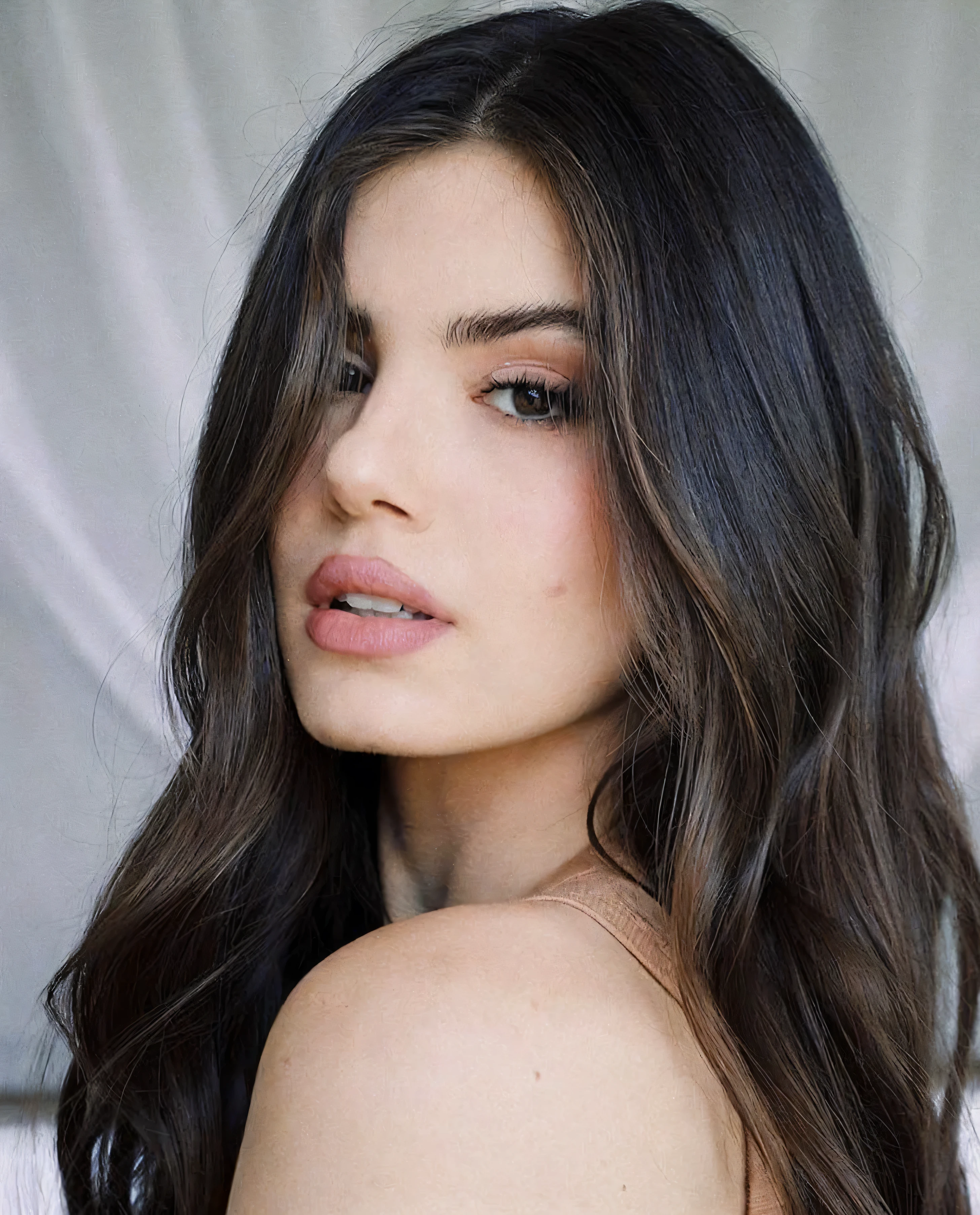 A feminine face claim. characteristics: long black hair, Jovial appearance (20 year), pale skin, straight and aligned eyebrows, dark eyes and striking look, cold and mysterious appearance, slightly filled and flushed mouths, Russian ancestry and without any blemishes on the face and human appearance. The eyebrows are close to the eyelids, the nose is delicate and thin.