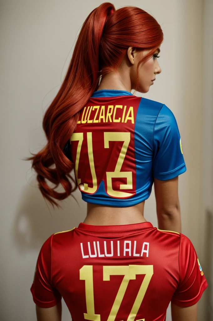 Image of a red-haired Barbie from the back with the Colombian national team shirt and on the shirt it says luzcla and the number 77