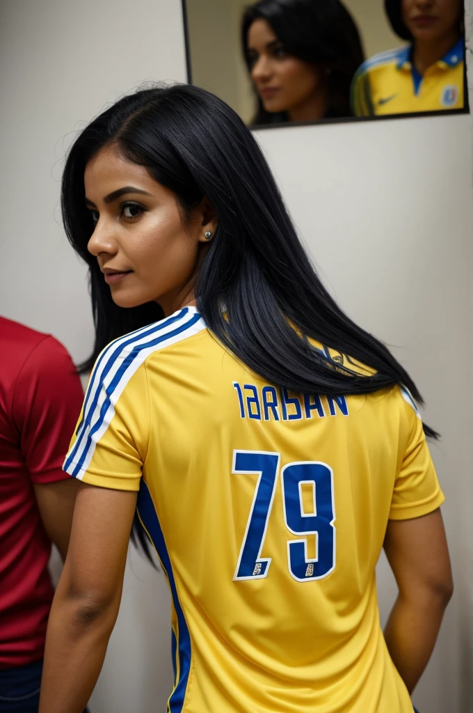 Woman turning hair back in bob , with the Colombian national team shirt, stamped with Leidy's name. Inside a football stadium