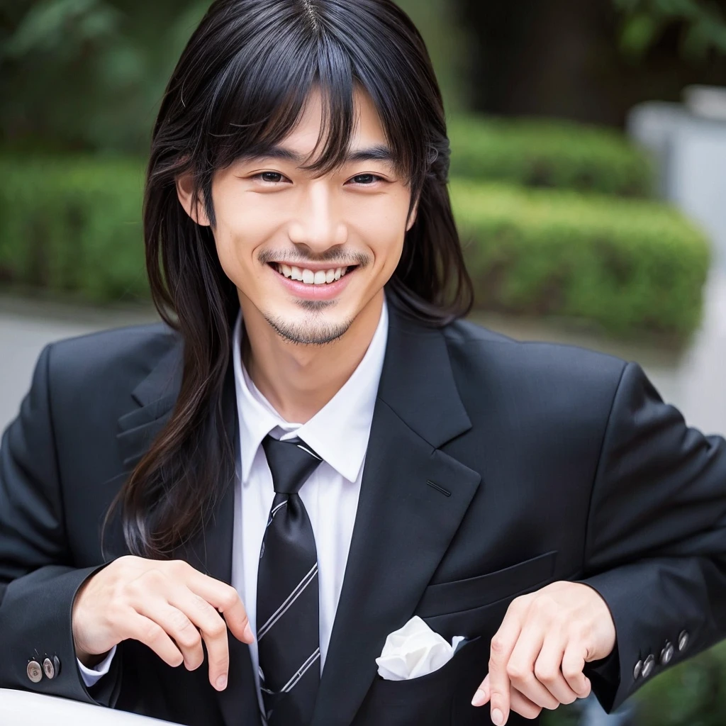 A handsome Japanese man with Japanese hair and a black suit is smiling toothlessly.