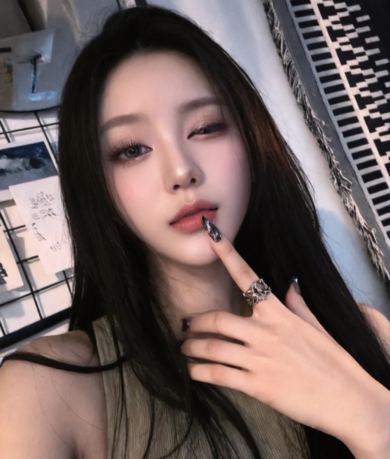 a close up of a woman with long hair and a ring on her finger, popular south korean makeup, cruel korean goth girl, popular korean makeup, ulzzang, korean girl, wan adorable korean face, beautiful south korean woman, korean face features, kanliu666, beautiful aesthetic face, gorgeous young korean woman, sexy face with full makeup, Karina aespa