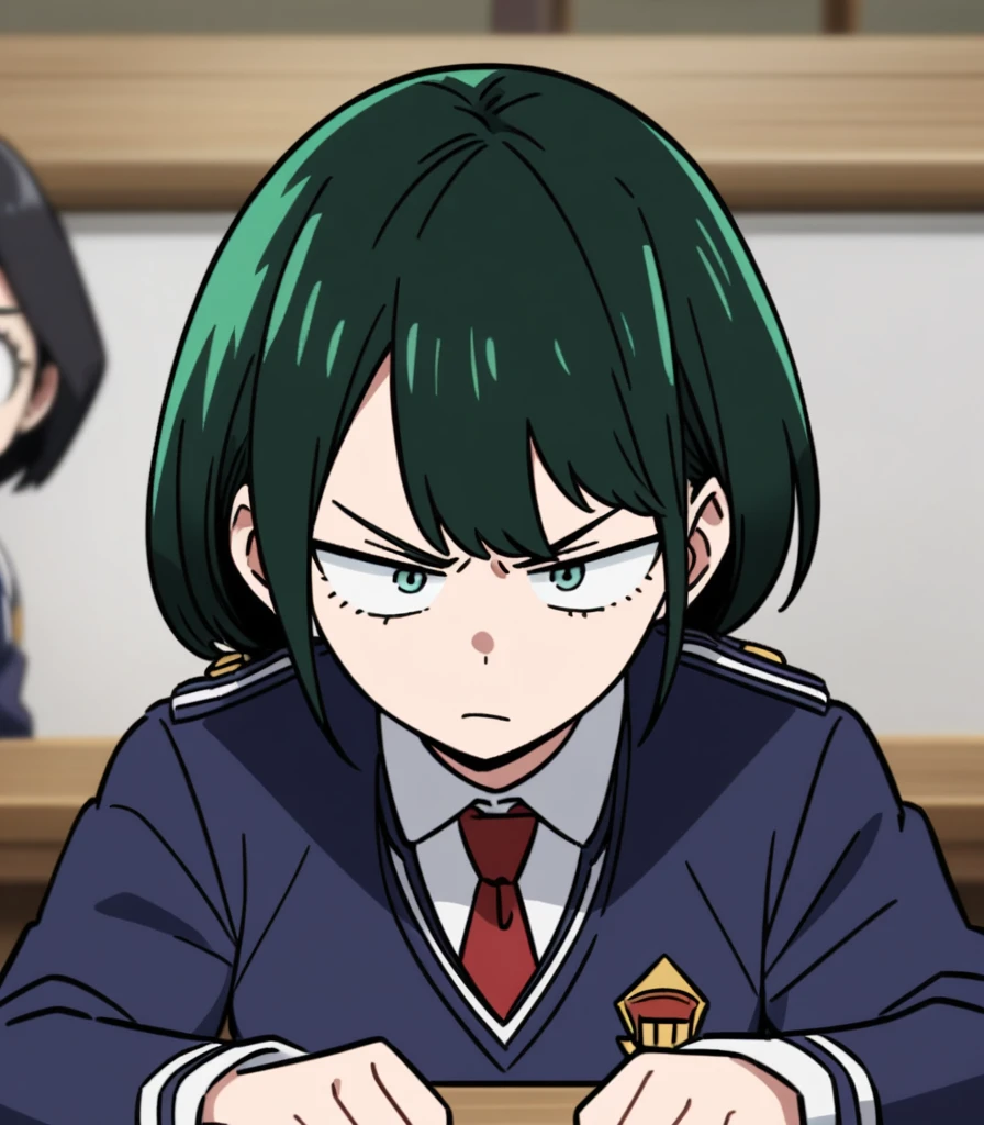 Screenshot of my hero academia.
Black hair girl with long green, He has gray eyes and has a serious expression. She is wearing the UA uniform and in the background she has a UA school class and she is sitting at a table