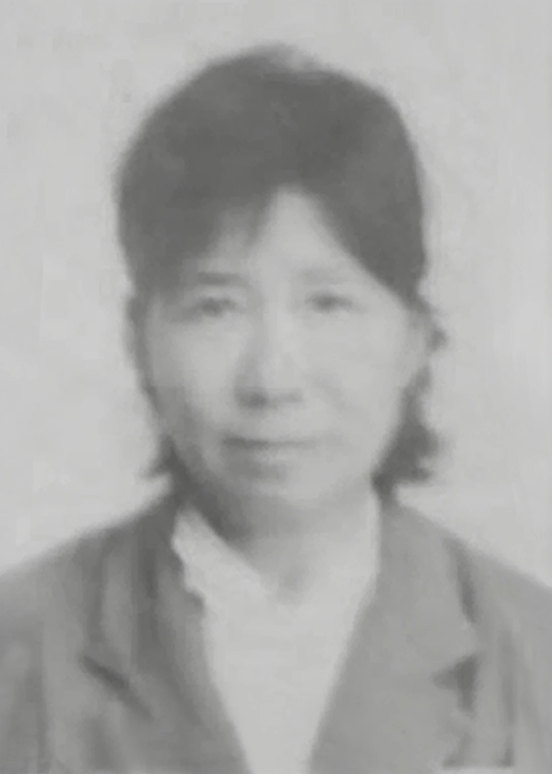 Chinese women in the old society wore a gray khaki coat with a small lapel and a white collared shirt underneath.,high resolution,Best quality,masterpiece,超high resolution,(Honesty:1.4),RAW photos