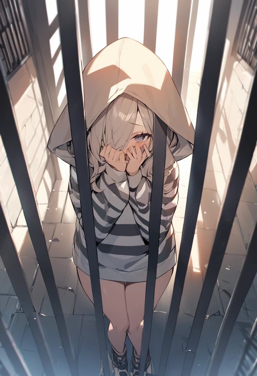prison、big prison、Woman hiding her face with a hood、looking at the camera、Stupid Witch、Are standing、Lonely、Burns on the face