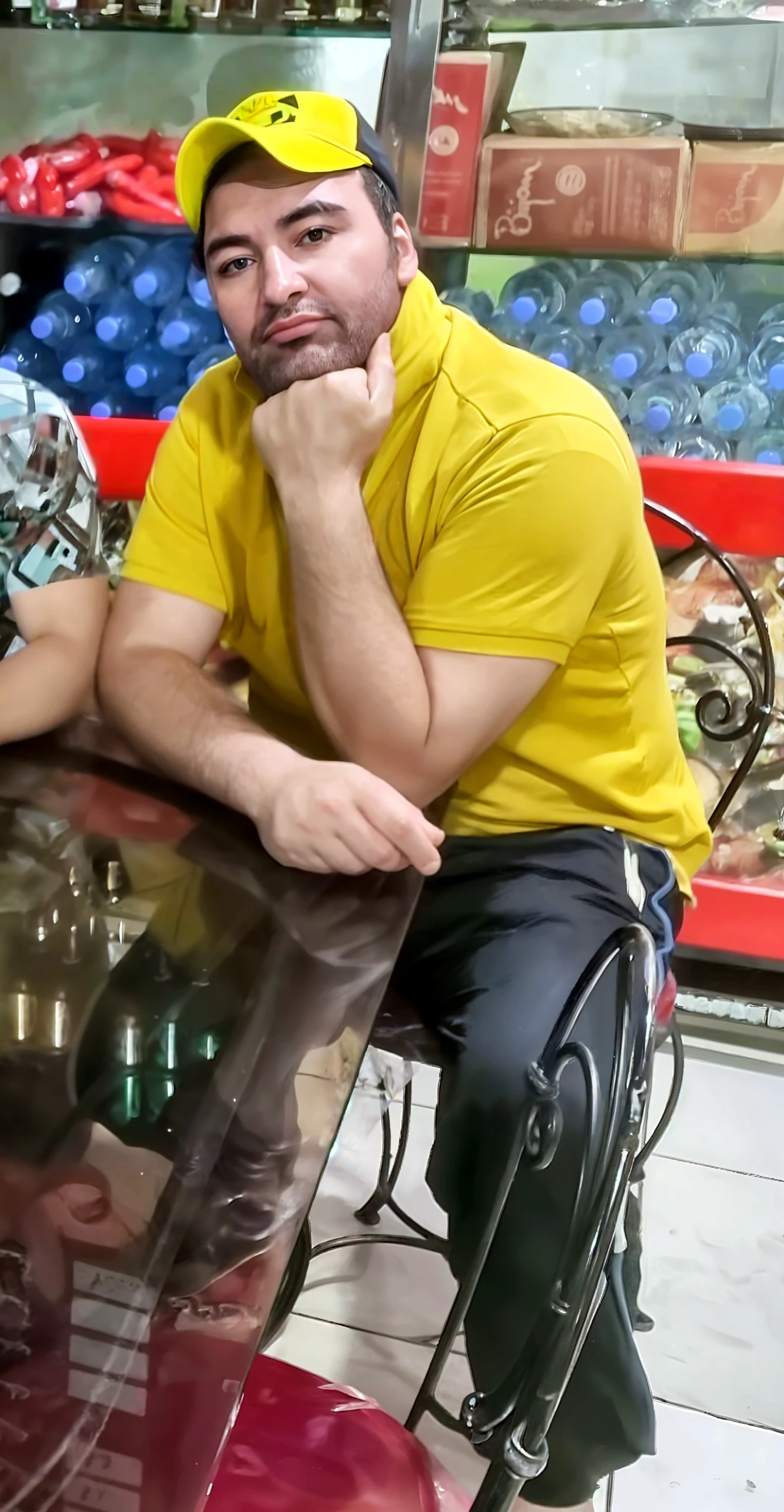 A sexy handsome pakistani muslim man in a cafe, sitting , homoerotic, handsome face, gorgeous hair, fashionable clothes , nsfw, homoerotic ,penis,(slightly curly hair: 0.2), testicles