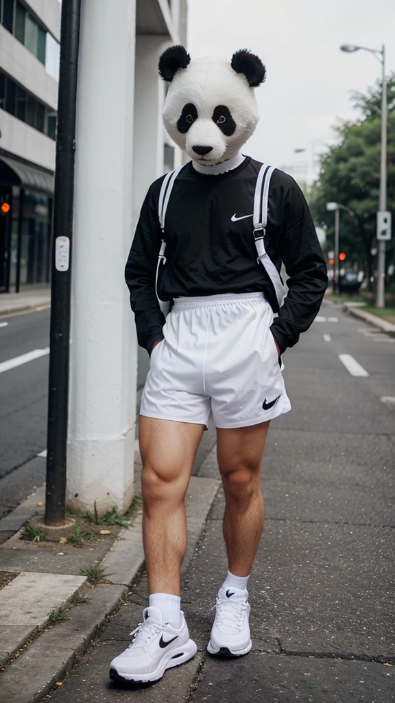 Panda man in a white mesh dress with black white shorts and black white Nike Air Max Alpha