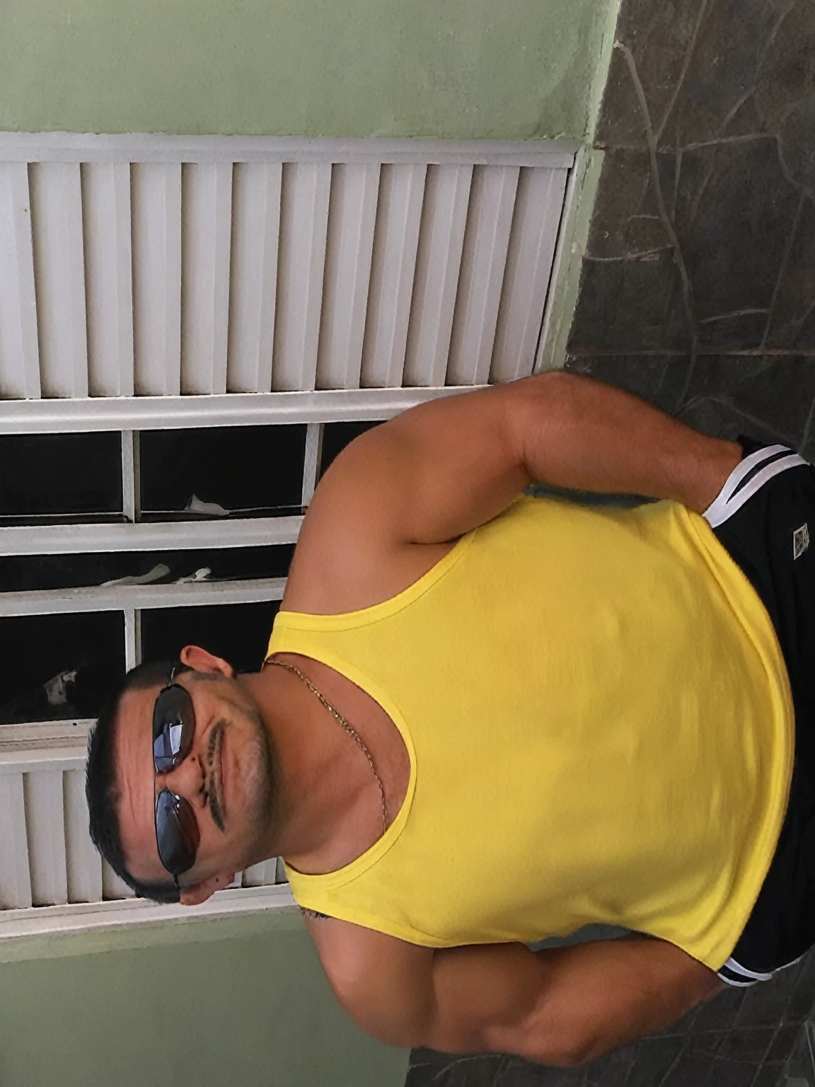 "(best qualityer,realisitic:1.37),portrait of a 35 year old person, dark-haired man, Buzz Cut, intense gaze,detailedeyes,eyes browns,Detailed lips,strong facial features,fine wrinkles,natural lighting,strong chin,determining expression,subtle stubble,neutral background,bright coloured"
