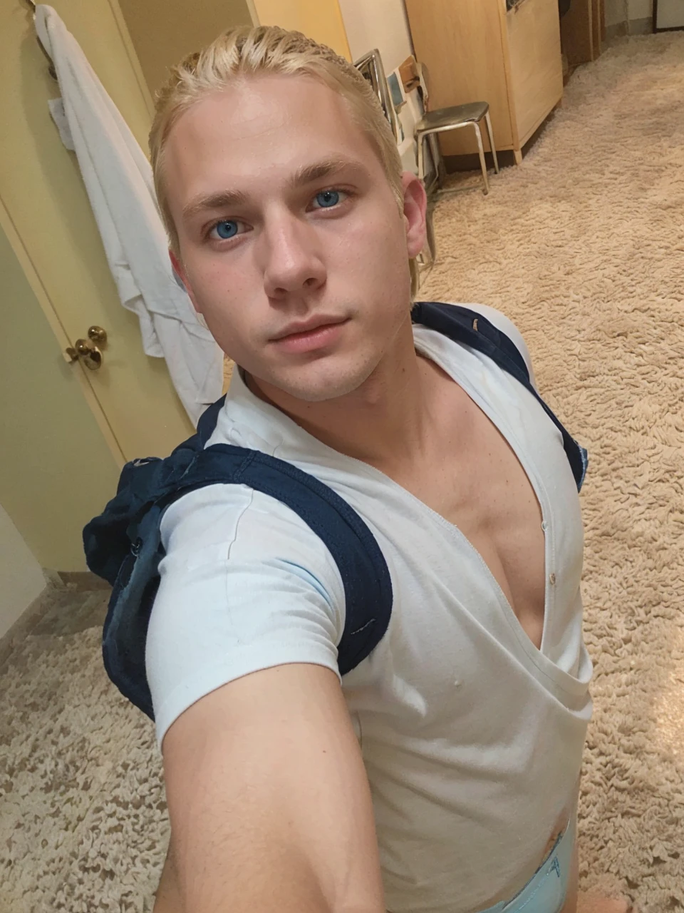 Very handsome 18 year old blonde boy in light blue underwear blue eyes and blonde hair