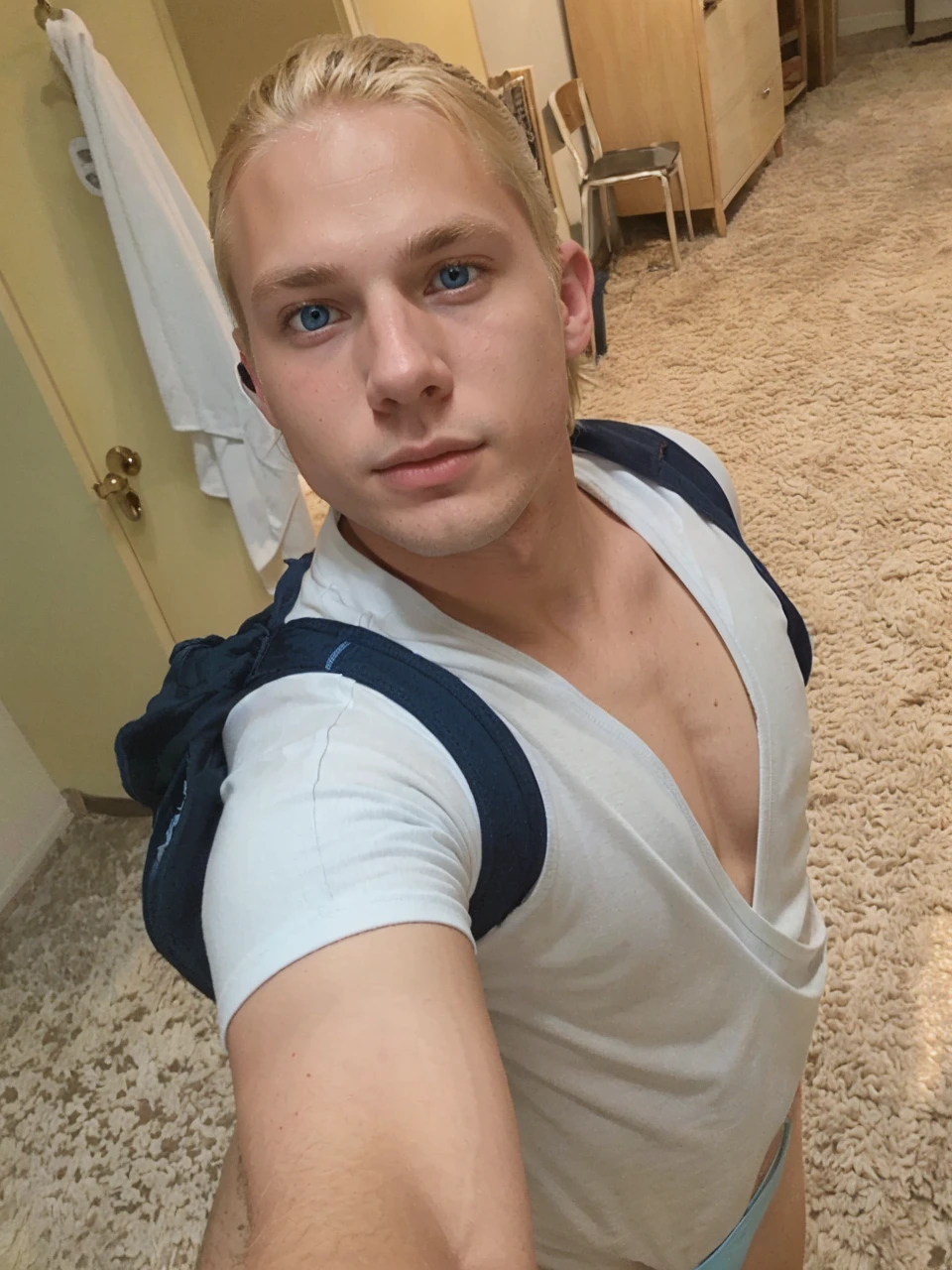 Very handsome 18 year old blonde boy in light blue underwear blue eyes and blonde hair