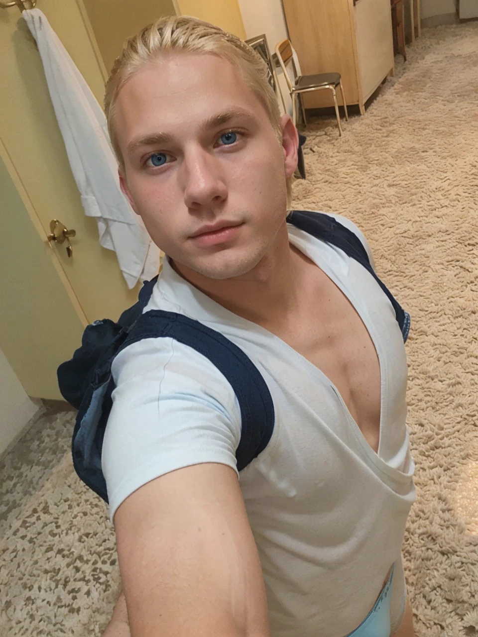 Very handsome 18 year old blonde boy in light blue underwear blue eyes and blonde hair