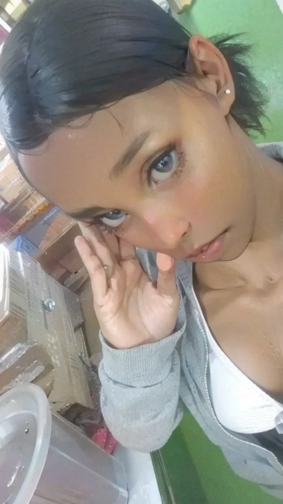 make her look like an anime with the same facial features, without losing any element of the photo