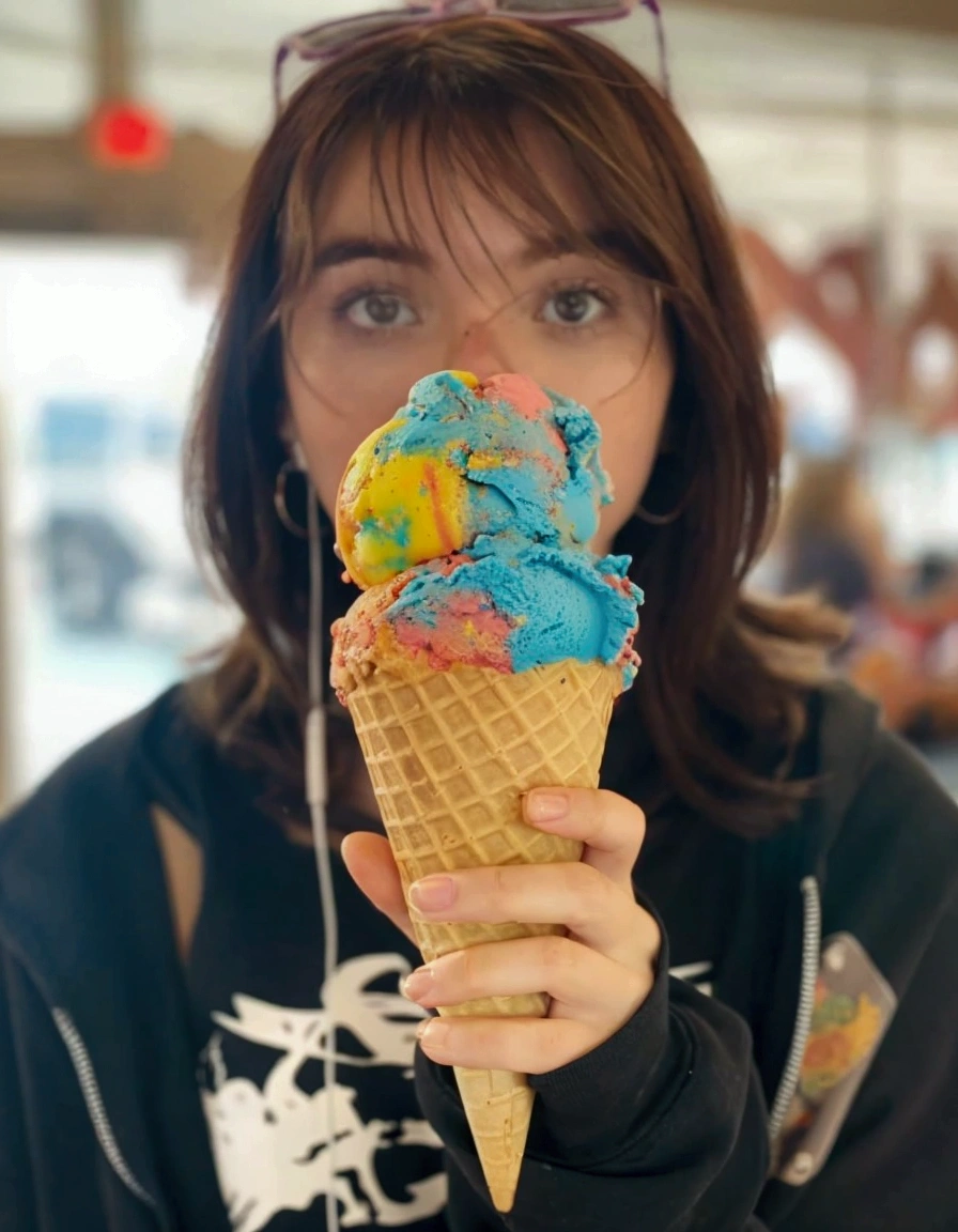 Replace the ice cream and cone and knsteand instead have the girl holding a mans dick infront of her.