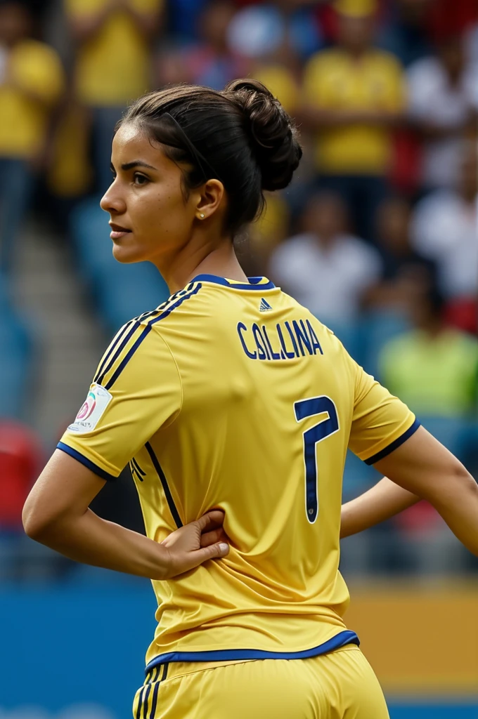 A woman from behind wearing the Colombia national team shirt with the name Cecilia 