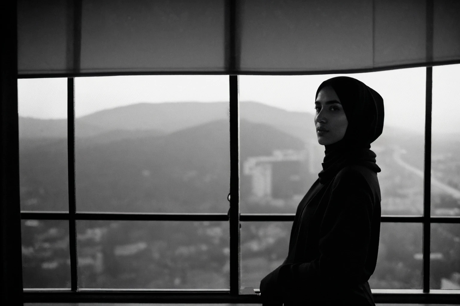 RAW photo,dark,moody,35mm focal lenght,underexposed,cold,candid photograph,artistic perspective,full body,photo of a beautiful,influencer,45yo Kurdish woman,black hijab, detailed skin,naked, looking away from viewer, thick body structure,grey background,no background, candid pose,dim room,blue light, film grain, kodak color, instagram LUT