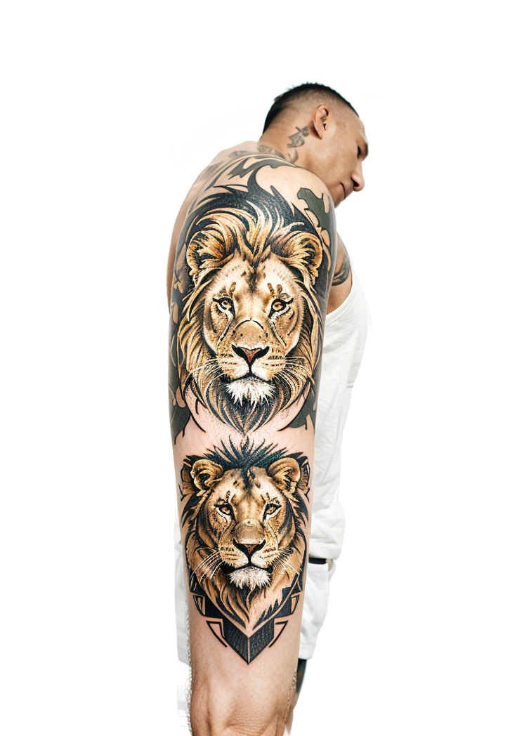 A tattoo with a regloc and a lion with one eye and with roses 