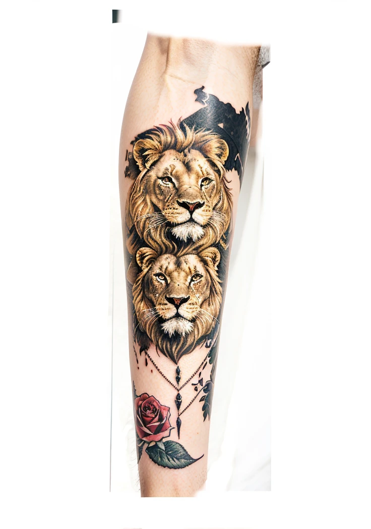 A tattoo with a regloc and a lion with one eye and with roses