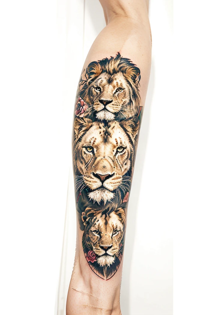 A tattoo with a regloc and a lion with an eye of a person and with roses 