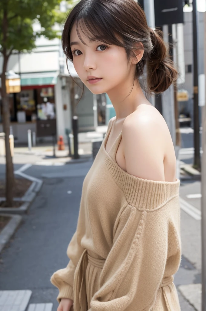 Pale-skinned Japanese . She is wearing a beige cold shoulder,