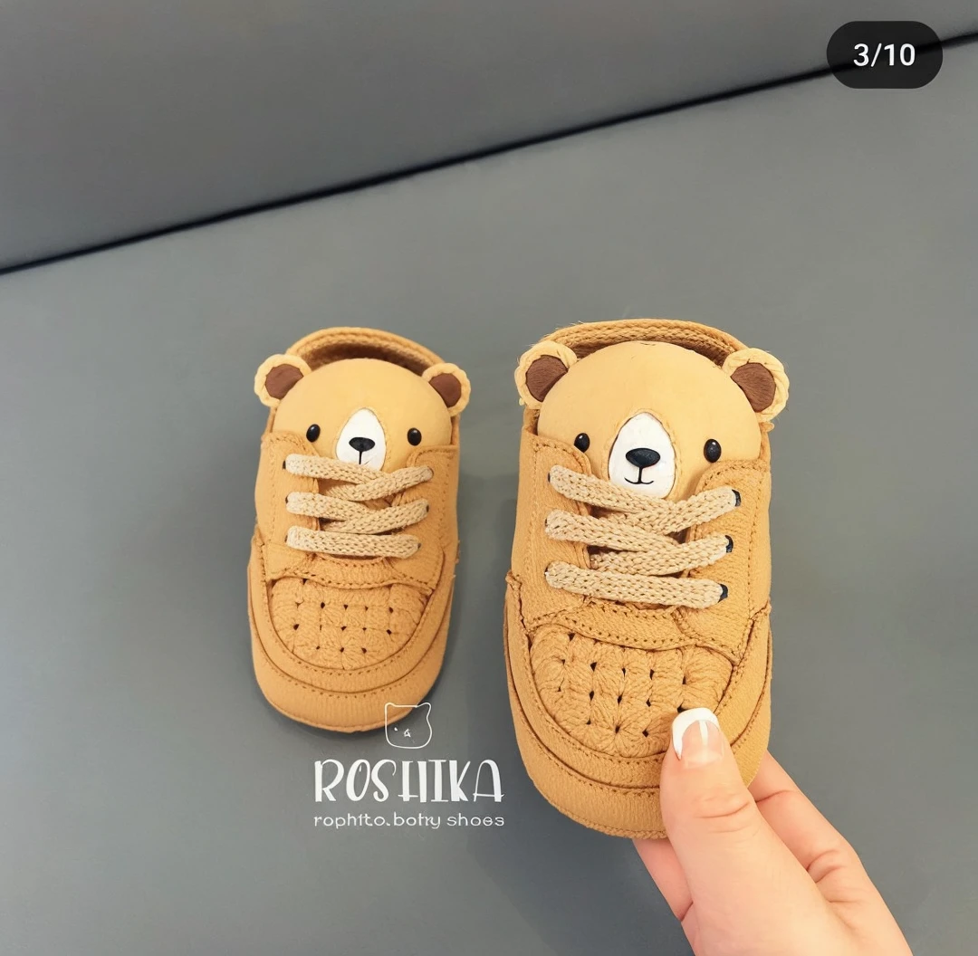 Crochet baby shoes with teddy bear detail