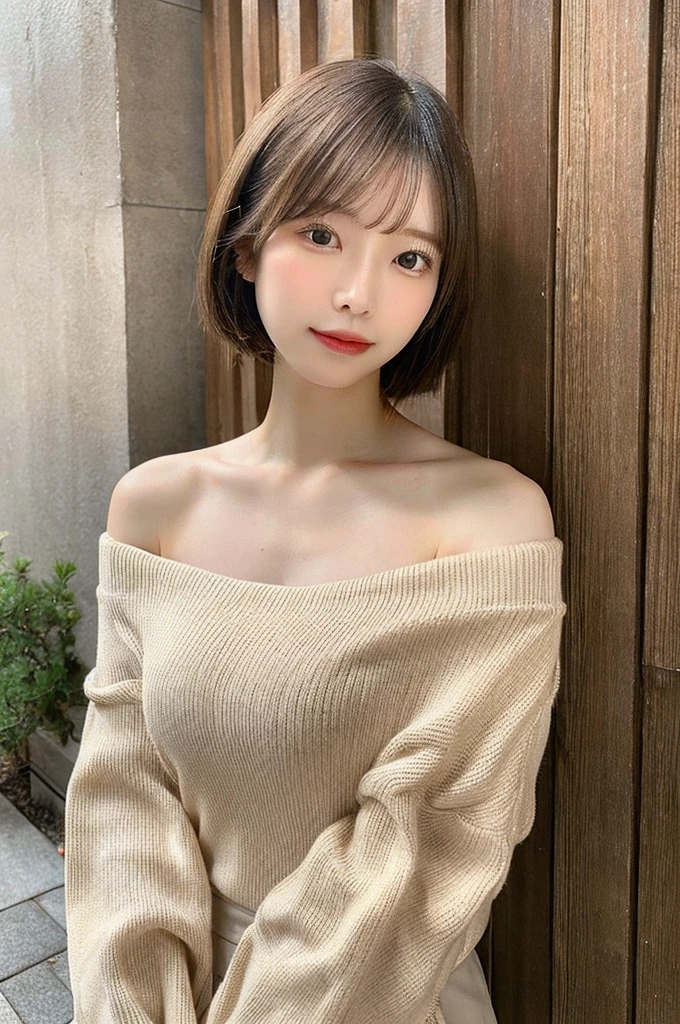 Pale-skinned Japanese . She is wearing a beige cold shoulder,