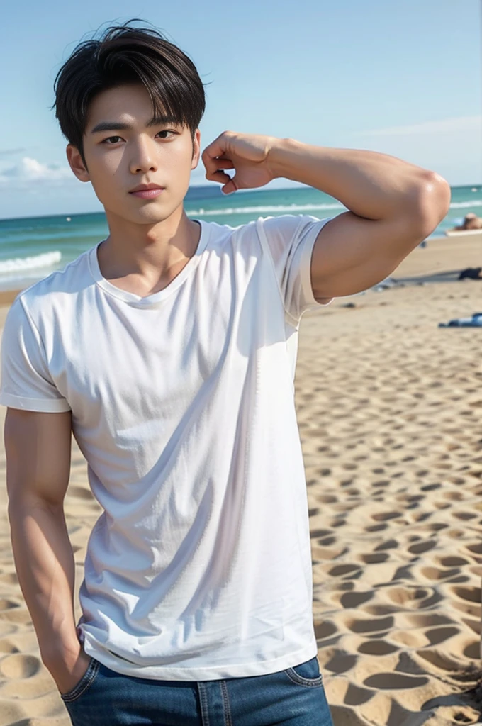 A young Asian man stands, handsome, muscular, looking at the camera. In a plain white t-shirt , Fieldside, grass, beach, sunlight