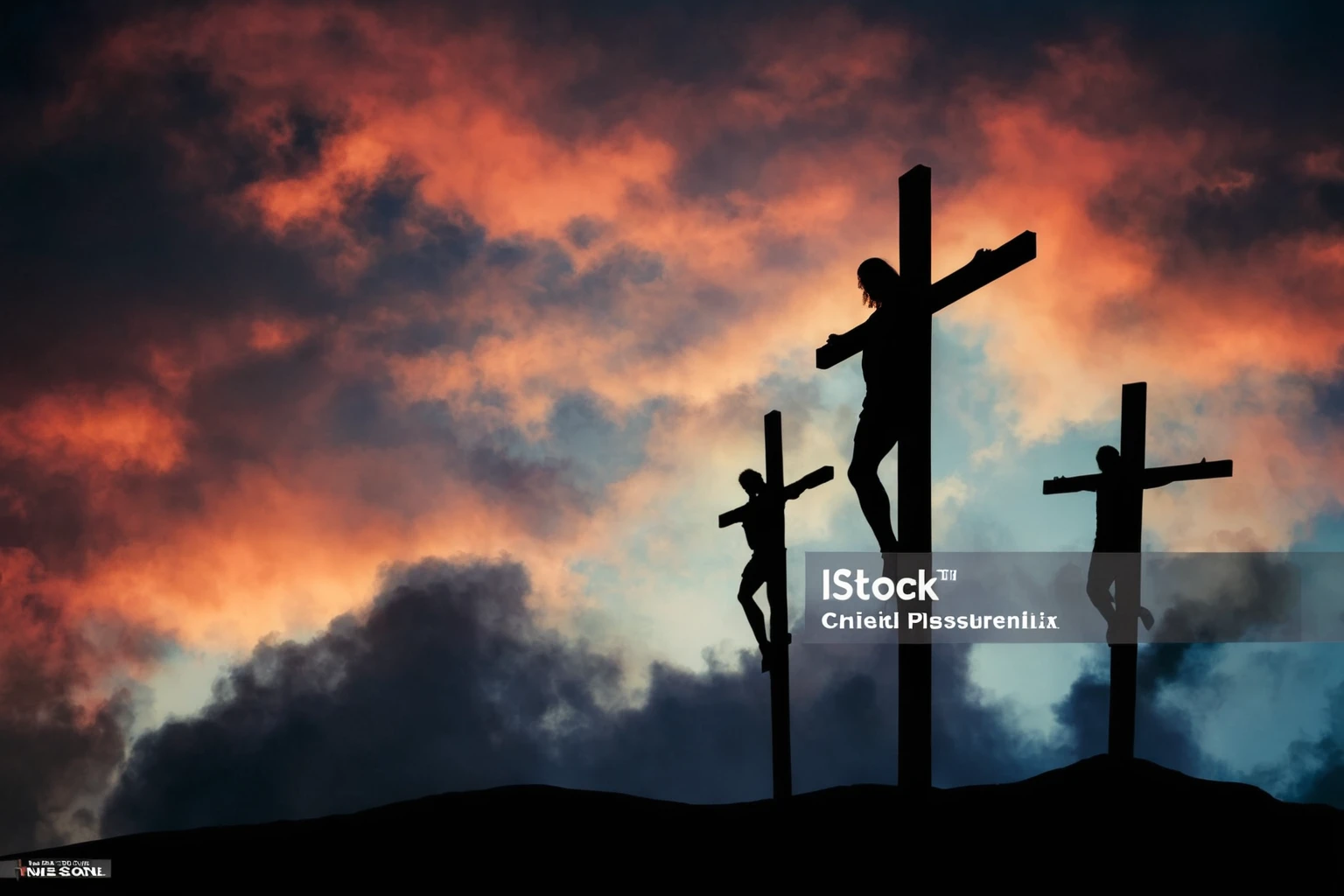 Jesus Christ on the cross along with 2 other men