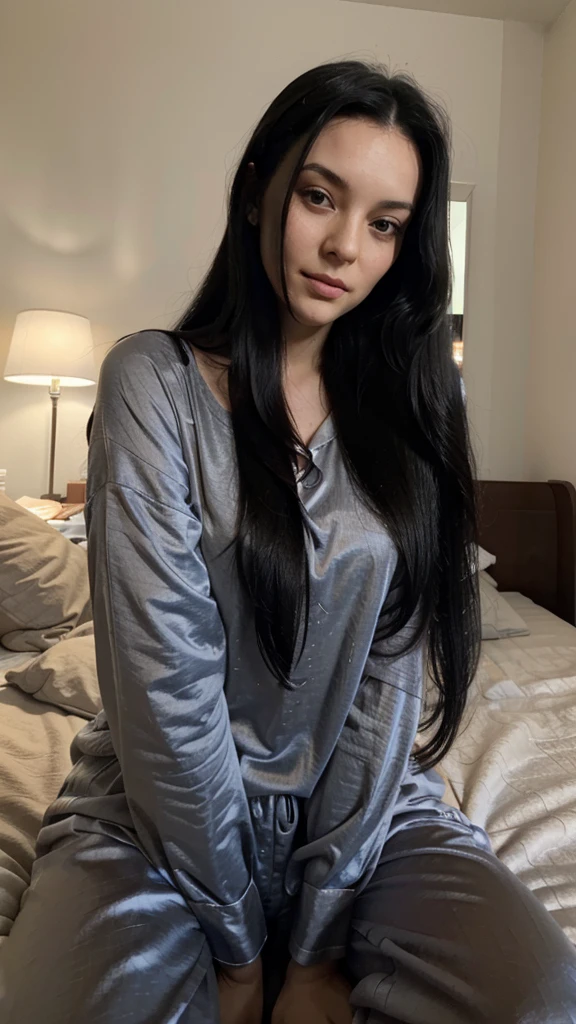 British lady with long black hair sitting on bed wearing pajamas, selfie