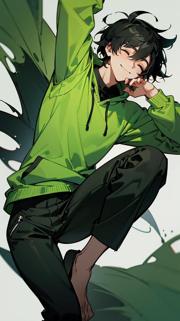 a young man wearing a green sweatshirt, black and gray pants, messy black hair, with closed eyes and smiling.