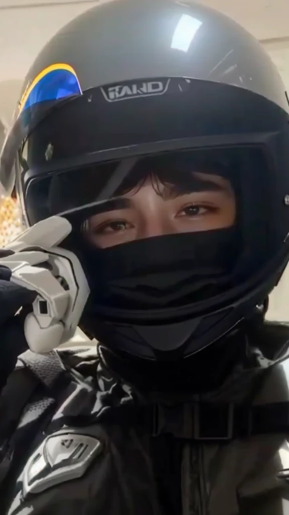 Arafed man with helmet talking on cell phone, dark visor that covers the face, Finn Wolfhard, dark visor that covers the upper part of the face, visor over the face, riding a motorcycle, without helmet, wearing a helmet, dark visor that covers the eyes, xqc, low quality footage, hood covers his eyes, wearing helmet, timothy chalamet, helmet on face