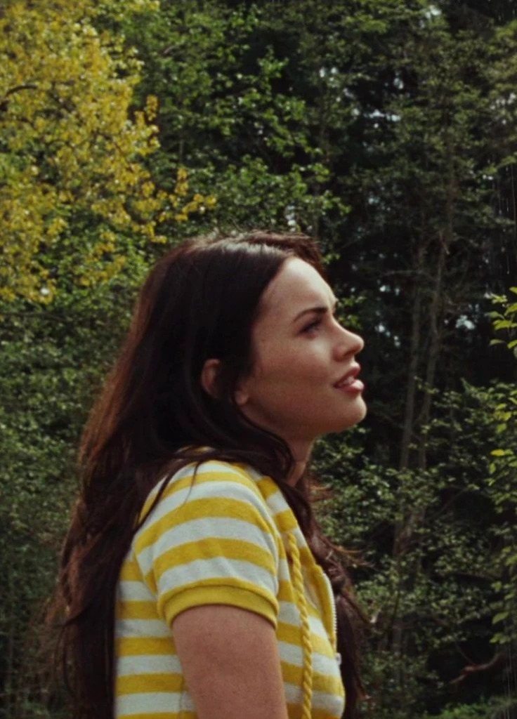 Sheltered woman standing in the rain in front of a motel sign, aura megan fox e fios, unearthly golden eyes, promotion still, unearthly, Iconic scene, Dean Winchester, profile pic, most memorable scene, promotional still wide angle, looking at her side, television still, intense combustion, programa de tv ainda, environmental photo
