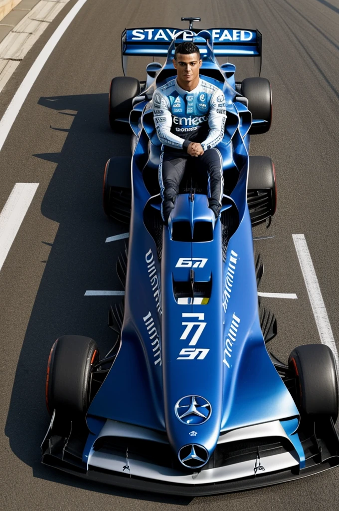 Cristiano Ronaldo wearing a blue mercedes f1 swit with the number seven in the middle and a mercedes f1 car behind him