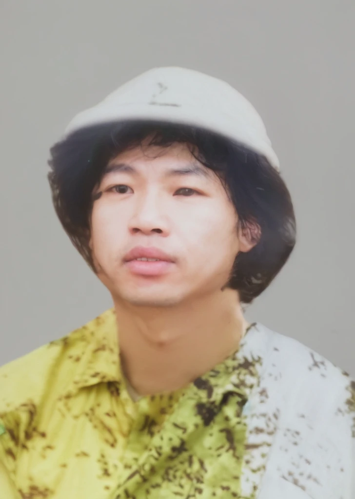 RAW photo of a 30 year old man, wearing a green Vietnamese army shirt, Asian, short black hair, real face, real skin, (photorealistic:1.4), (high detail soft skin:1.2 ), 8k uhd, dslr, soft light, high quality, grain film, Fujifilm XT