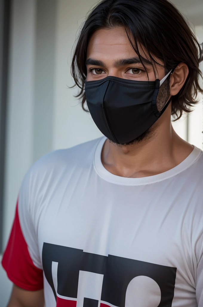 A man wearing a Flamengo shirt with a mask covering his face and in the middle of the shirt written Davi