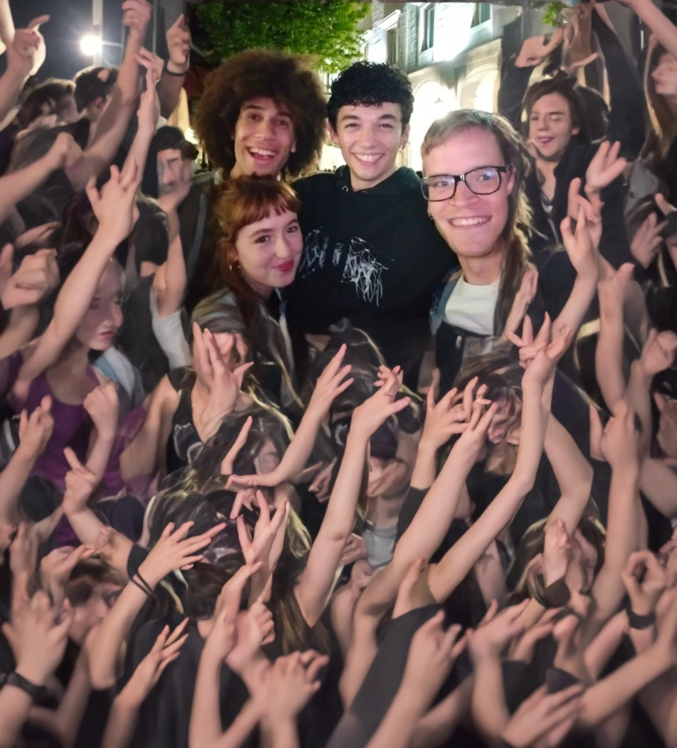 In a rave concert. Dancing with too much people.