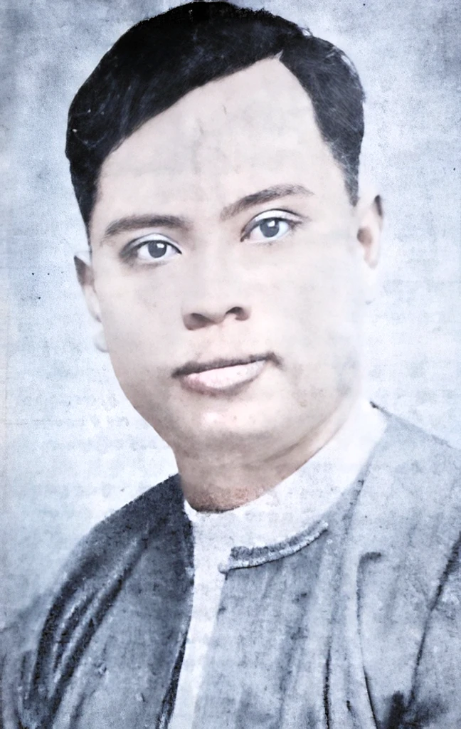 man portrait. smooth skin, black hair. black jacket over the white shirt. white background.