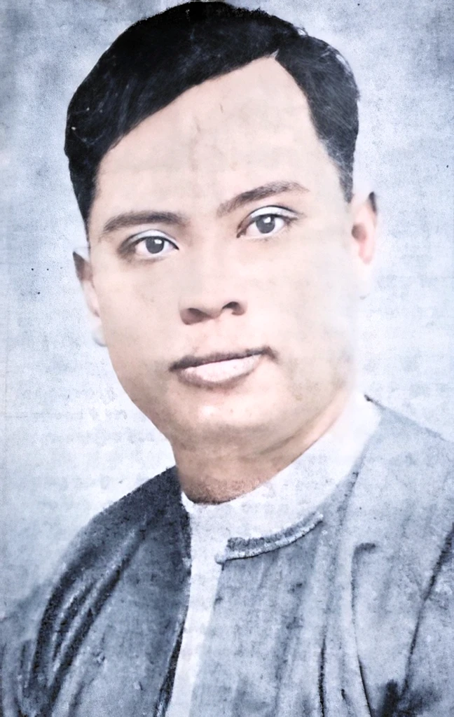 man portrait. smooth skin, black hair. black jacket over the white shirt. white background.