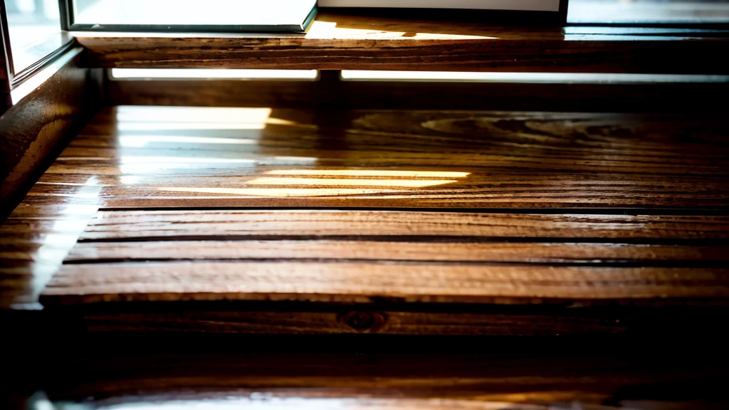 a notebook on a wooden desk, high detailed 3rd person view, 16:9 aspect ratio, cinematic lighting, photorealistic, detailed wood texture, detailed glass screen, screen reflection, shallow depth of field, minimal background, clean and tidy composition