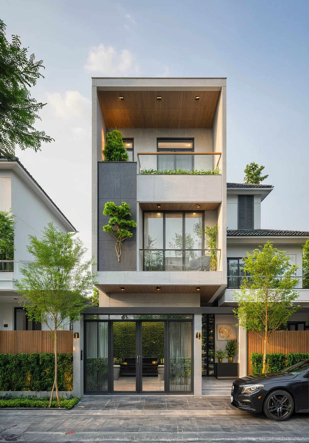 modern villa on street, (daylight), tropical tree, green shrub and plants, vivid color, streetcapes, minimalist design, brigth grey tone, (large glass door:1.2), warm interior lighting, modern material, best quality, ultra realistic, masterpiece,