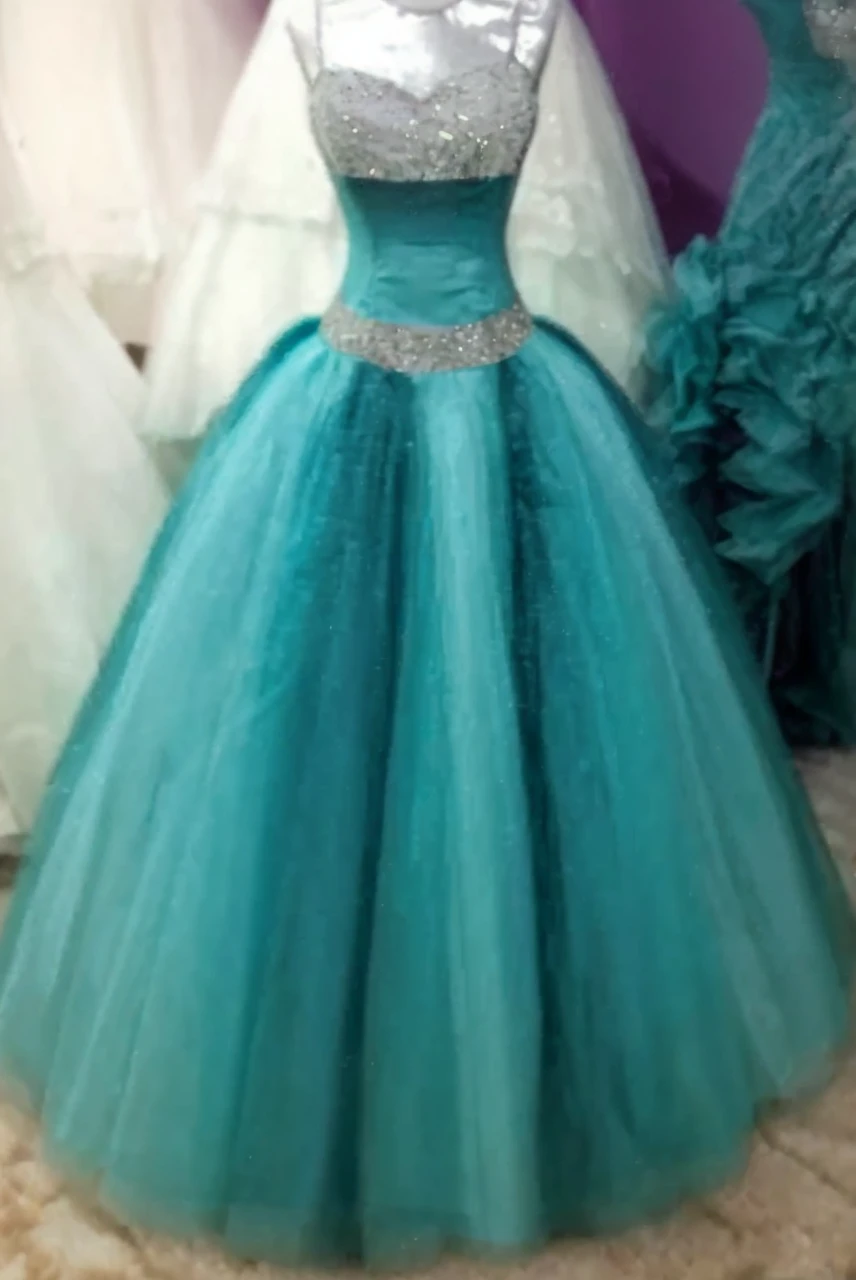 Hyperrealistic image of light turquoise-silver dress