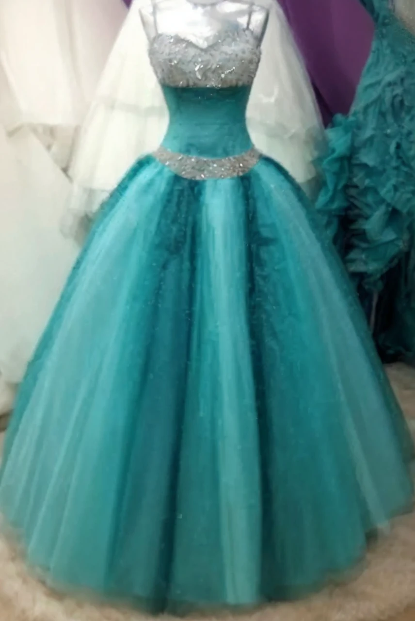 Hyperrealistic image of light turquoise-silver dress