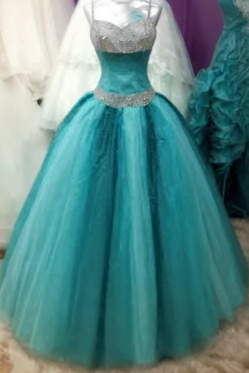 Hyperrealistic image of light turquoise-silver dress