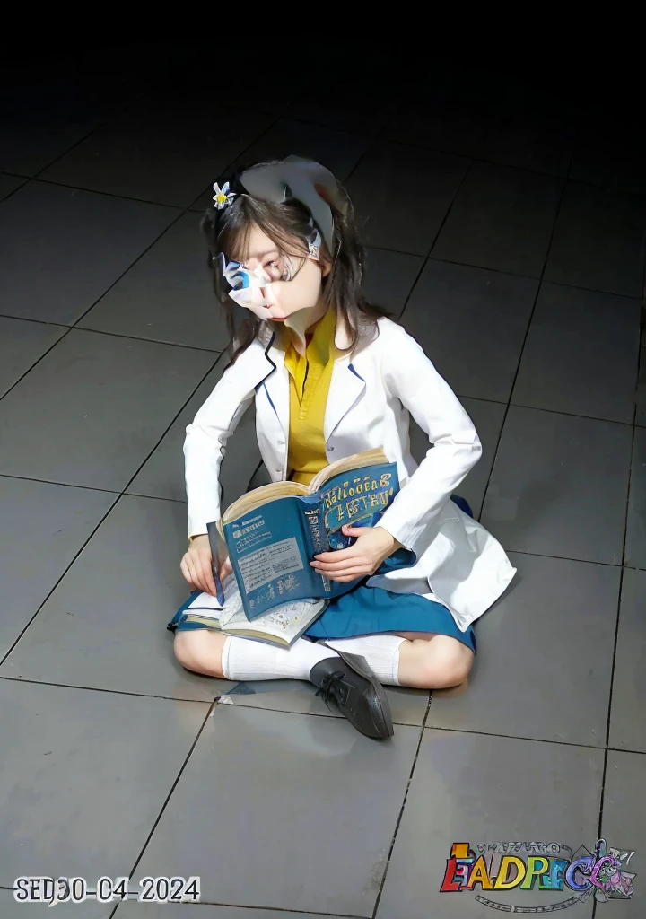 Girl, dark hair, blue eyes, flower hairpin, white lab coat, yellow shirt, blue skirt, black shoes, white socks, dark blue calculus book,writing,studying on the floor, half dark room