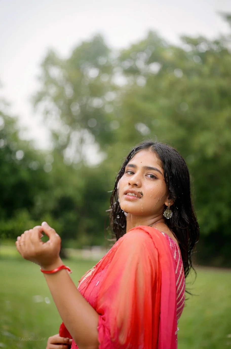 Highest quality, (photoRealistic:1.4), professional photograph, intricate composition, an extremely delicate and beautiful, 8k, ultra high res, cinematic lighting and shading, ((Realistic image of a attractive Indian girl, solo)), extremely pretty girl standing on the street, Amazing cute and well-featured face, parted lips, cute natural cleavage, (Beautifully curved hourglass body shape), (Casual summer dress very soaking wet), ((Hair flapping in the wind)), dripping wet hair, dripping clear drops, Like a dramatic scene from a movie, POV, extremely detailed eyes and face, eyes with beautiful details, insanely detailed beautiful natural skin texture, Accurate eyes, Accurate hands, (Well-balanced overall body)