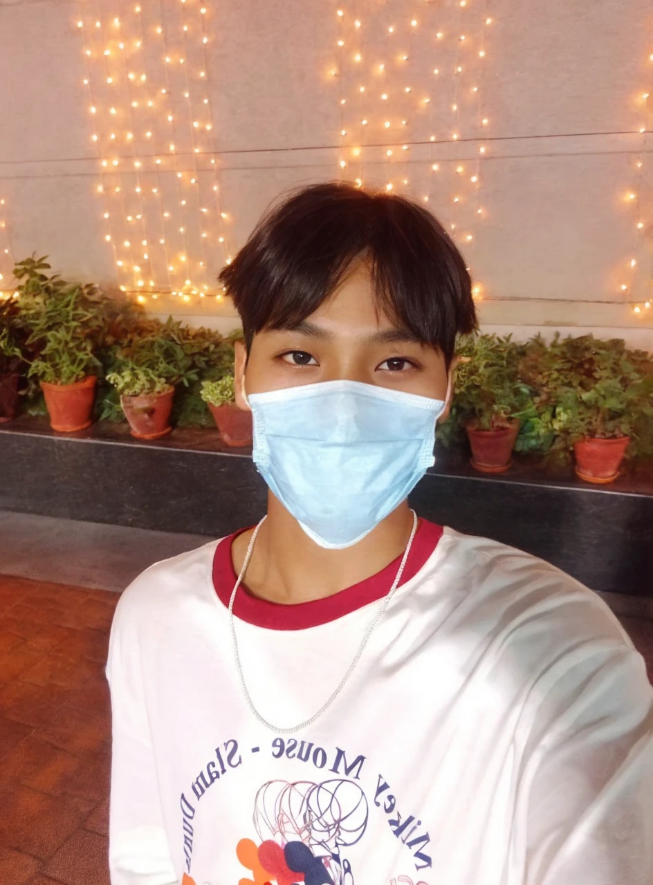 Generate a hyper-realistic image of a charming 8-year-old South Korean boy with:
- Luscious, dark hair that falls effortlessly across his forehead
- A bright, beaming smile that showcases his pearly whites
- Distinct double eyelids that add depth to his expressive eyes
- A perfectly proportioned 'V'-shaped face with high cheekbones and a pointed chin
- Smooth, radiant skin with a subtle glow
- Intricate details that capture the subtleties of human features
- Ultra-high definition quality with precise textures and shading
Create an image that looks like it was a selfie taken by his phone , with meticulous attention to detail and a natural, effortless pose that exudes innocence and charm.