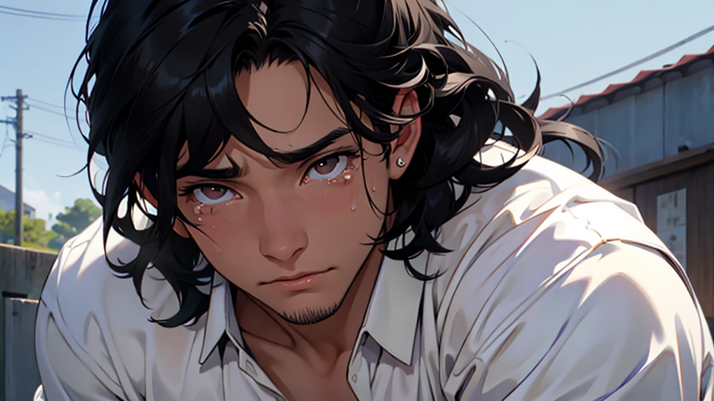 young man with black hair eyes with tears