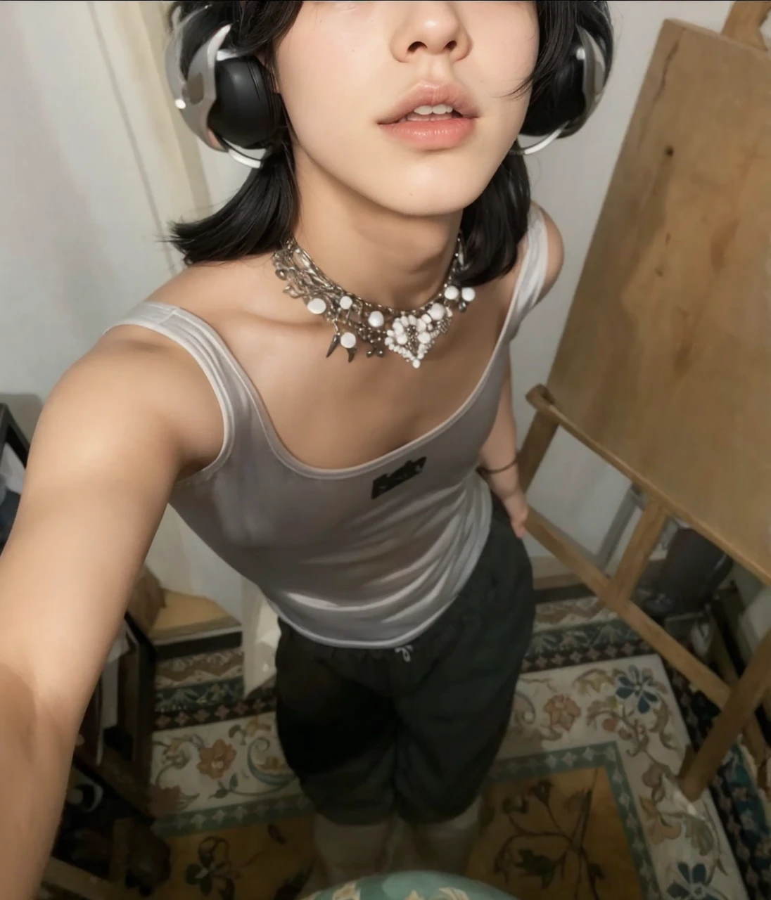 black hair boy, full lips, straight nose and masculine face. straight body, no breasts