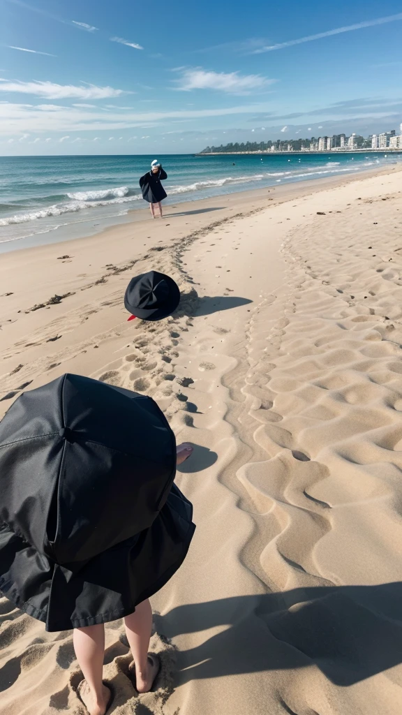 Image of graduates throwing away their hats and not seeing their faces, young people , in the sand of a beach as a background