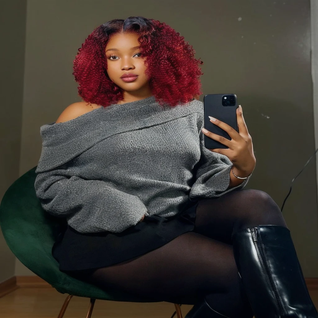 there is a woman sitting in a chair holding a cell phone, with curly red hair, red curly hair, with red hair, red afro, curly red hair, photo of a black woman, big red afro, selfie of a young woman, thick thighs, young black woman, she has red hair, red dyed hair, curly copper colored hair, black young woman